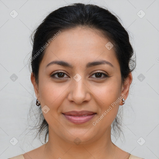 Joyful latino young-adult female with medium  brown hair and brown eyes