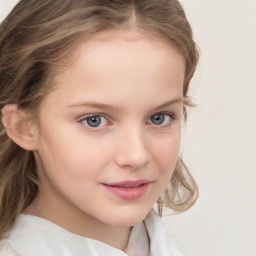 Joyful white child female with medium  brown hair and blue eyes