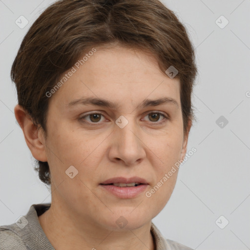 Joyful white adult female with short  brown hair and grey eyes