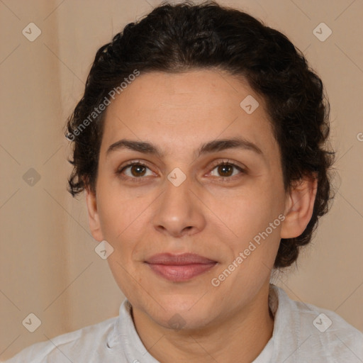 Joyful white adult female with short  brown hair and brown eyes