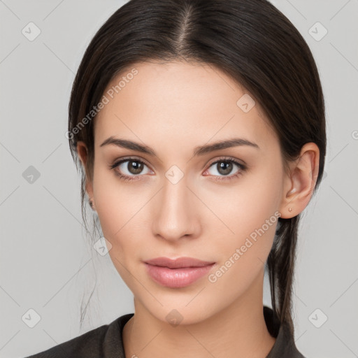 Neutral white young-adult female with long  brown hair and brown eyes