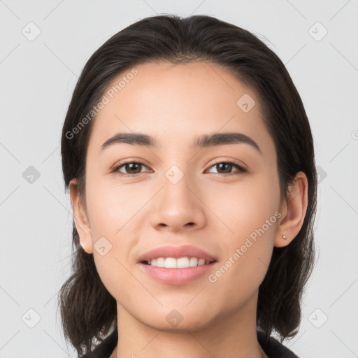 Joyful white young-adult female with medium  brown hair and brown eyes