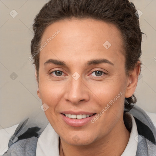 Joyful white adult female with short  brown hair and brown eyes