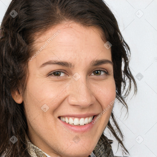 Joyful white adult female with long  brown hair and brown eyes