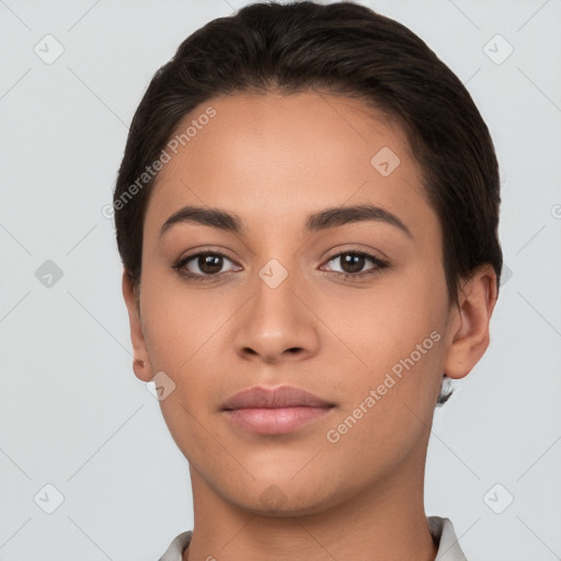 Neutral white young-adult female with short  brown hair and brown eyes