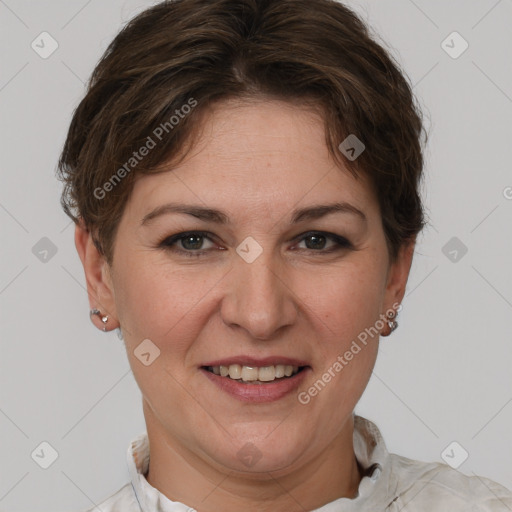 Joyful white adult female with short  brown hair and grey eyes