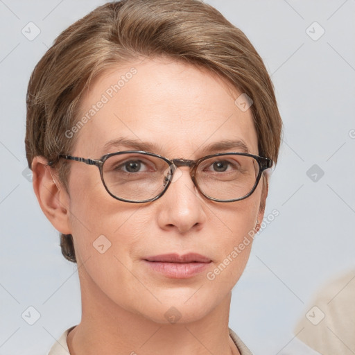 Joyful white adult female with short  brown hair and grey eyes