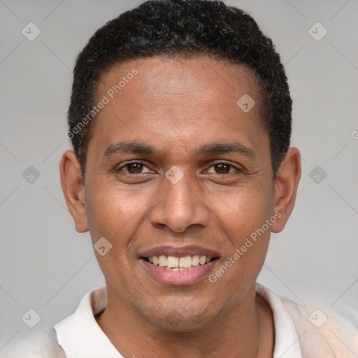 Joyful latino young-adult male with short  brown hair and brown eyes