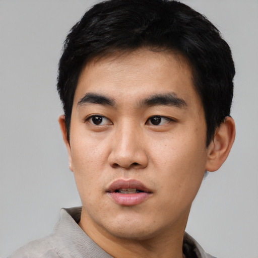 Neutral asian young-adult male with short  black hair and brown eyes