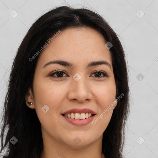 Joyful latino young-adult female with long  brown hair and brown eyes