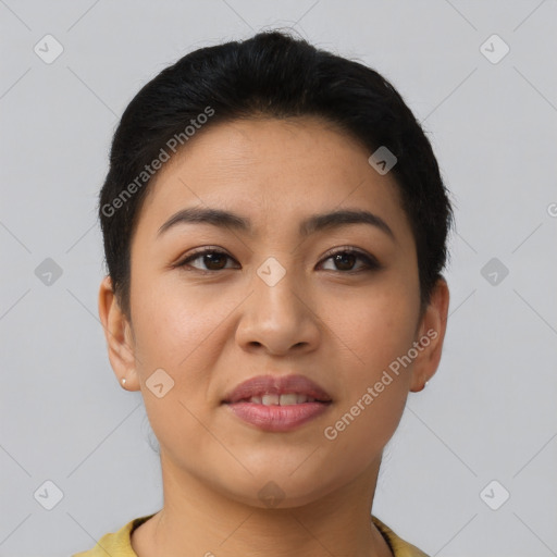 Joyful asian young-adult female with short  brown hair and brown eyes