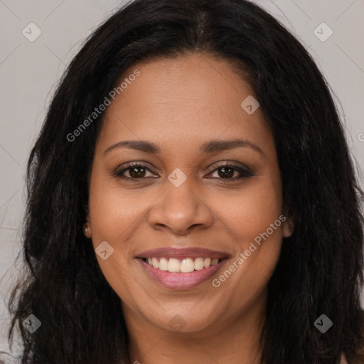 Joyful latino young-adult female with long  brown hair and brown eyes