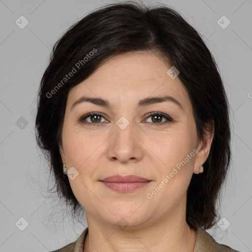 Joyful white adult female with medium  brown hair and brown eyes