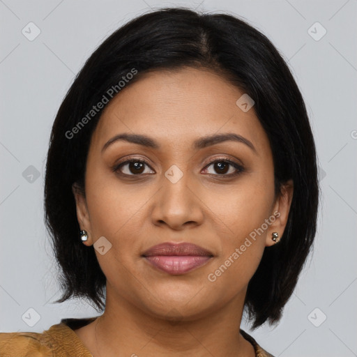 Joyful latino young-adult female with medium  brown hair and brown eyes