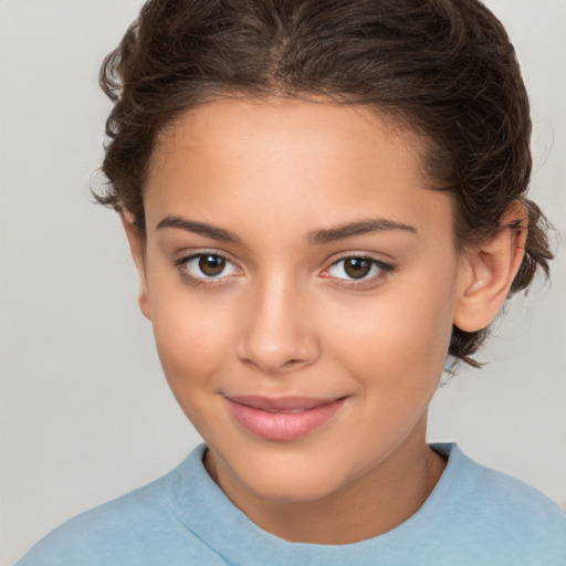 Joyful white child female with medium  brown hair and brown eyes