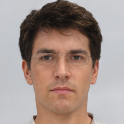 Neutral white adult male with short  brown hair and brown eyes