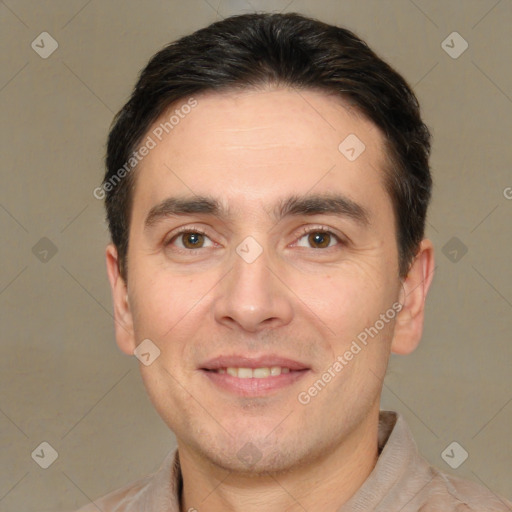 Joyful white adult male with short  brown hair and brown eyes