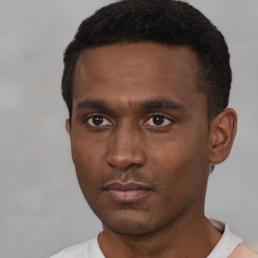 Neutral black young-adult male with short  black hair and brown eyes