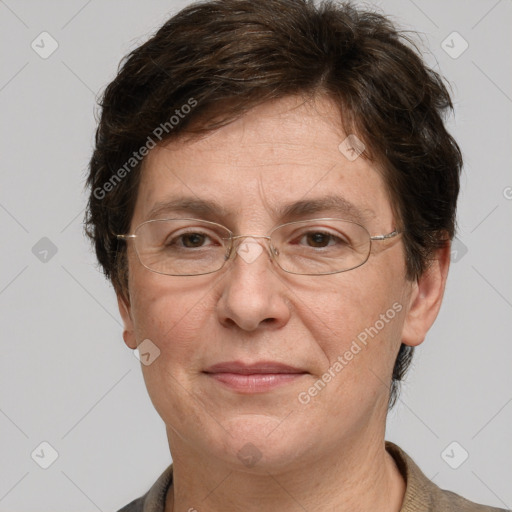 Joyful white adult female with short  brown hair and grey eyes