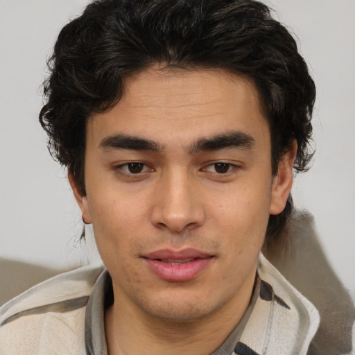 Joyful latino young-adult male with short  brown hair and brown eyes
