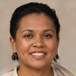 Joyful white adult female with short  brown hair and brown eyes