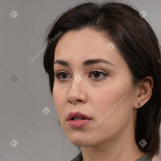 Neutral white young-adult female with medium  brown hair and brown eyes