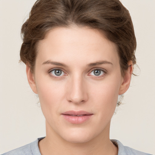 Neutral white young-adult female with short  brown hair and grey eyes