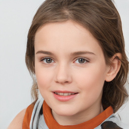 Joyful white child female with medium  brown hair and brown eyes