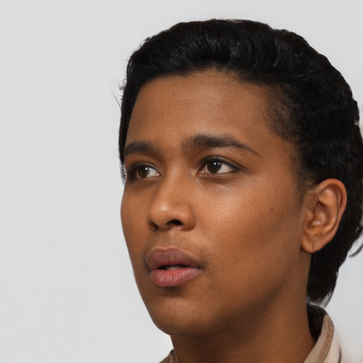 Neutral black young-adult female with short  black hair and brown eyes