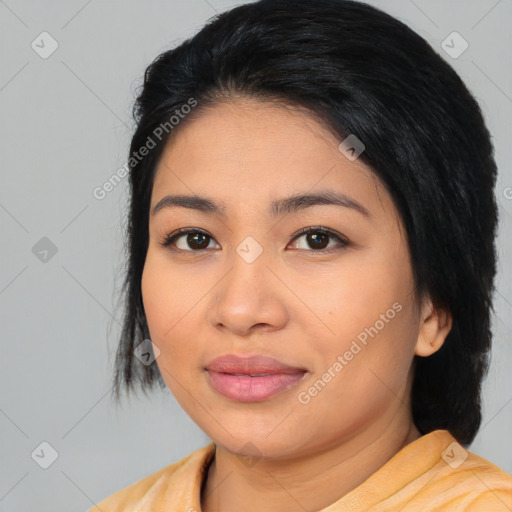 Joyful asian young-adult female with medium  black hair and brown eyes