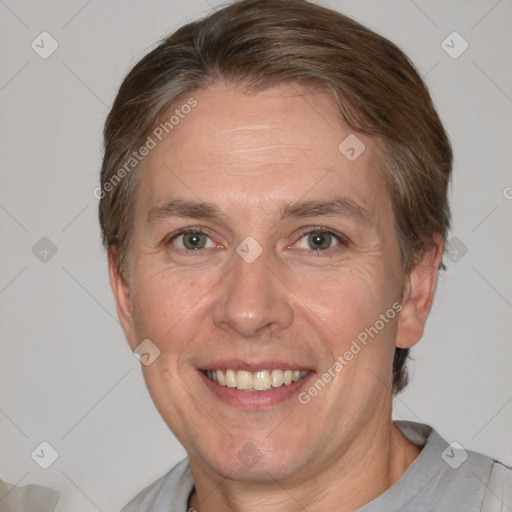 Joyful white adult female with short  brown hair and brown eyes