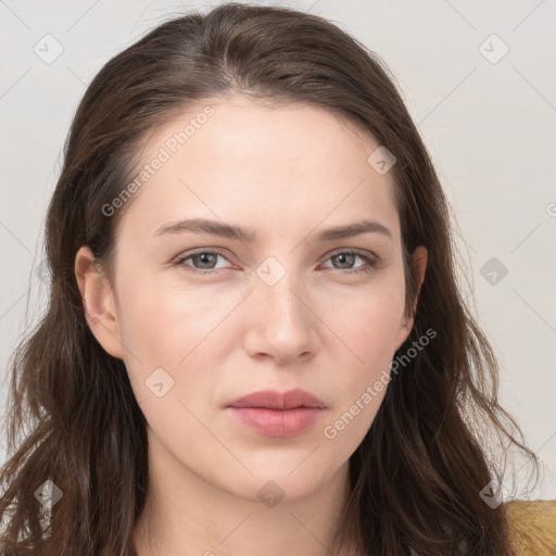 Neutral white young-adult female with long  brown hair and brown eyes