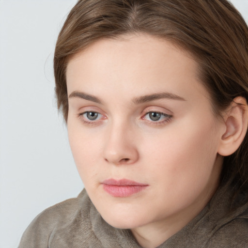 Neutral white young-adult female with long  brown hair and grey eyes