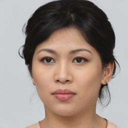 Neutral asian young-adult female with medium  brown hair and brown eyes