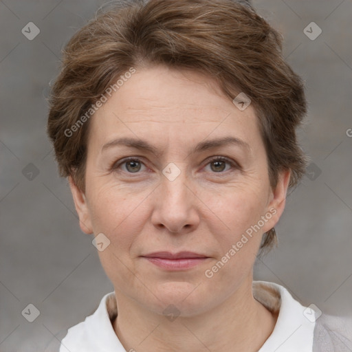 Joyful white adult female with short  brown hair and brown eyes