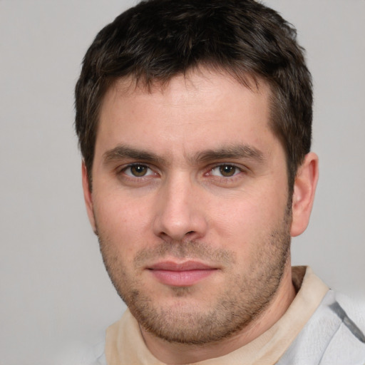 Neutral white young-adult male with short  brown hair and brown eyes