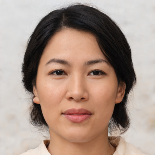 Neutral asian young-adult female with medium  black hair and brown eyes