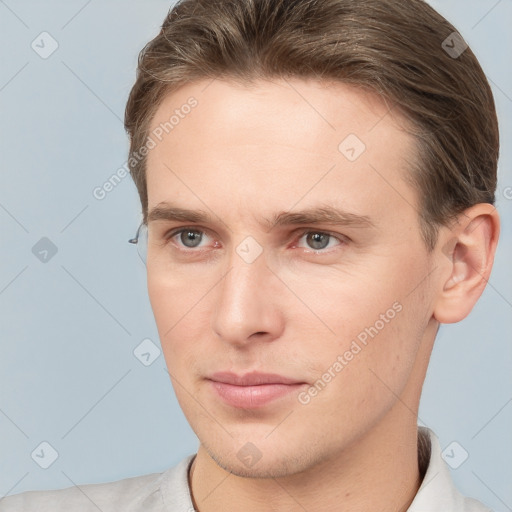 Neutral white young-adult male with short  brown hair and brown eyes