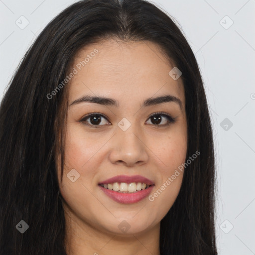 Joyful asian young-adult female with long  brown hair and brown eyes