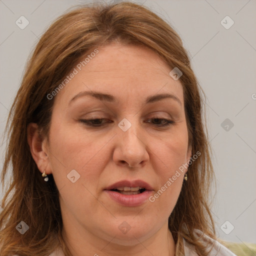 Joyful white adult female with medium  brown hair and brown eyes