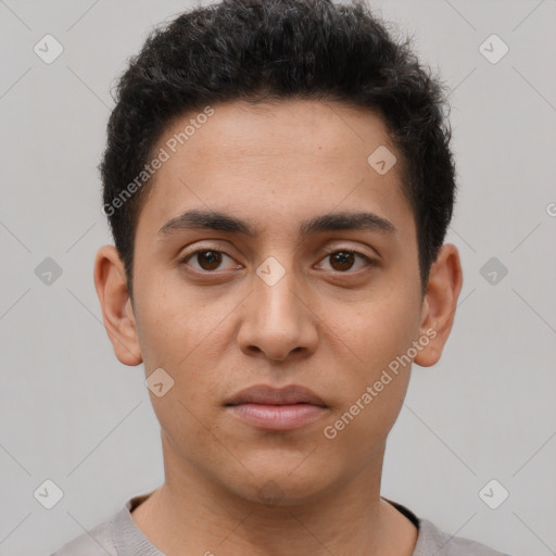 Neutral latino young-adult male with short  brown hair and brown eyes