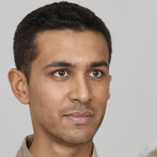Neutral latino young-adult male with short  brown hair and brown eyes