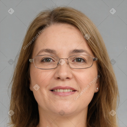 Joyful white adult female with long  brown hair and brown eyes