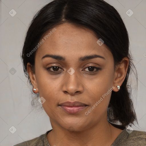 Joyful latino young-adult female with medium  brown hair and brown eyes