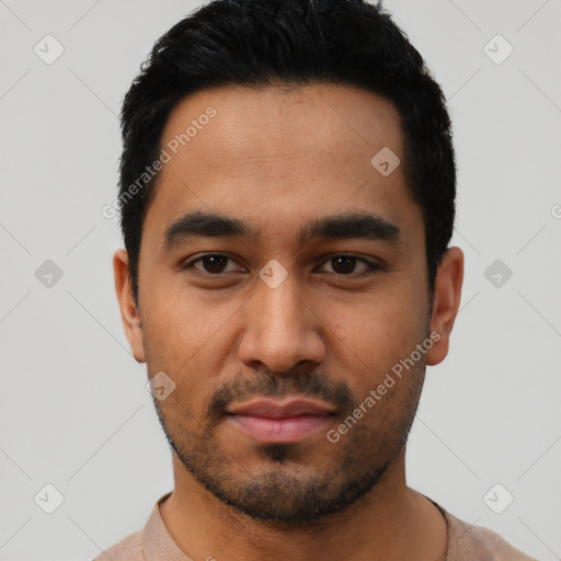 Neutral latino young-adult male with short  black hair and brown eyes