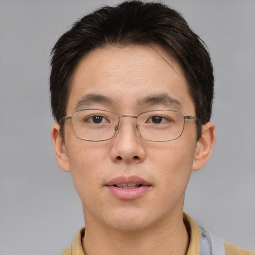Neutral asian adult male with short  brown hair and brown eyes
