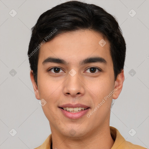 Joyful white young-adult male with short  black hair and brown eyes