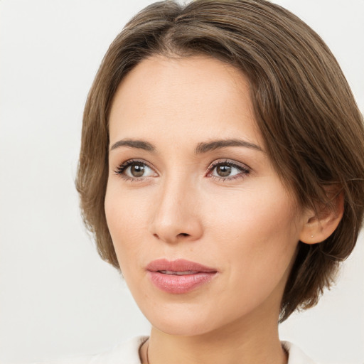 Neutral white young-adult female with medium  brown hair and brown eyes