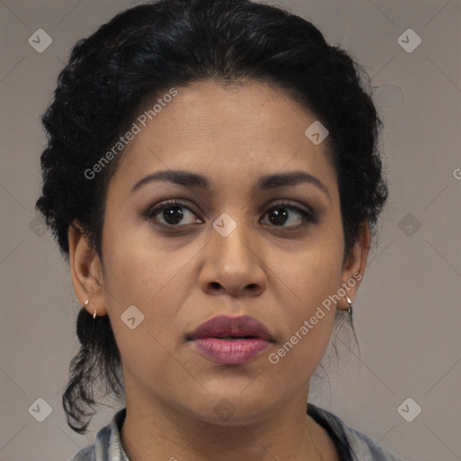 Joyful latino young-adult female with medium  black hair and brown eyes