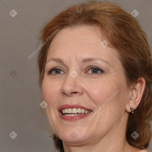 Joyful white adult female with medium  brown hair and brown eyes